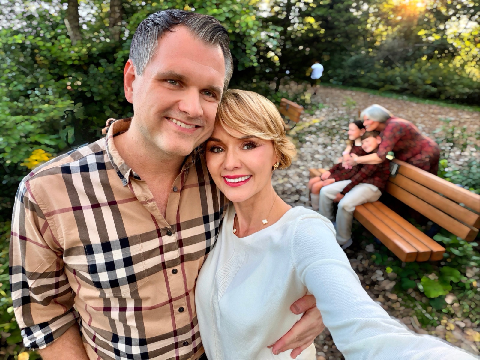 Victoria with her husband outdoors